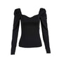 Maglia con manica a sbuffo