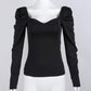 Maglia con manica a sbuffo