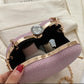Clutch Cuore Rosa Glitterata con Catena Dorata e Chiusura Gioiello in strass