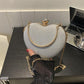 Clutch Cuore Rosa Glitterata con Catena Dorata e Chiusura Gioiello in strass